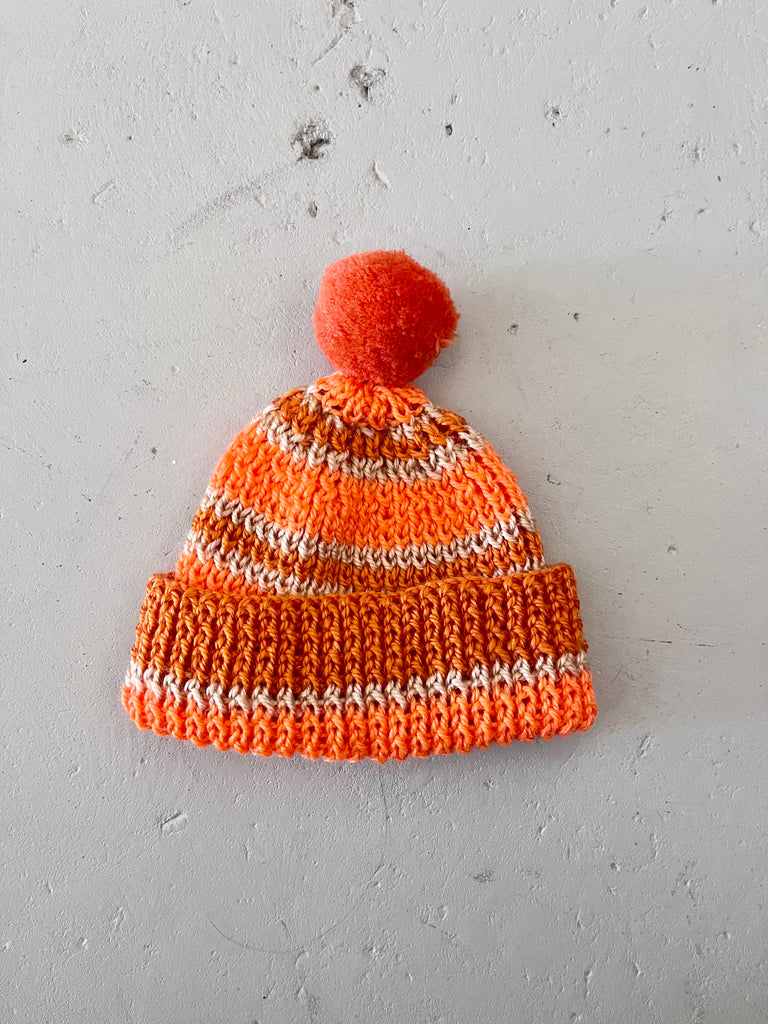 HANDKNIT BEANIE -  ORANGE POM